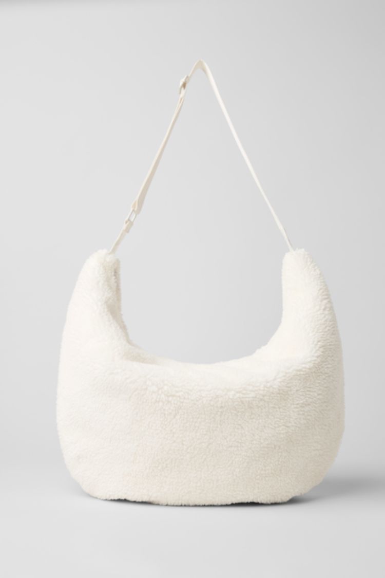 SHERPA OM THE GO SLING BAG