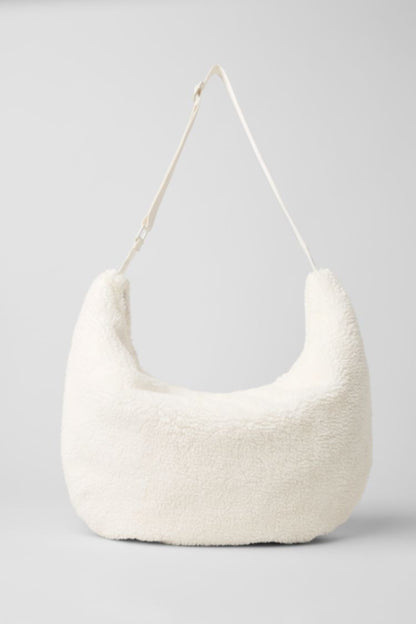 SHERPA OM THE GO SLING BAG